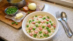 Risotto prosciutto e piselli cremoso: il trucco della mantecatura con latte e burro