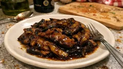 Melanzane in agrodolce in padella: il contorno semplice con aceto e zucchero